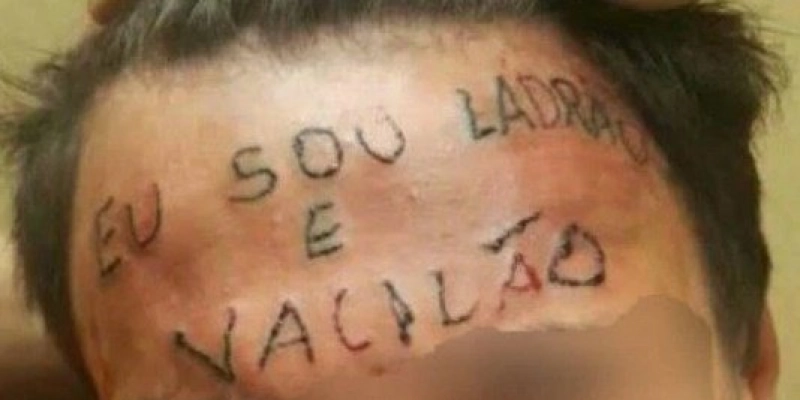Homem com tatuagem “eu sou ladrão e vacilão” - Reprodução