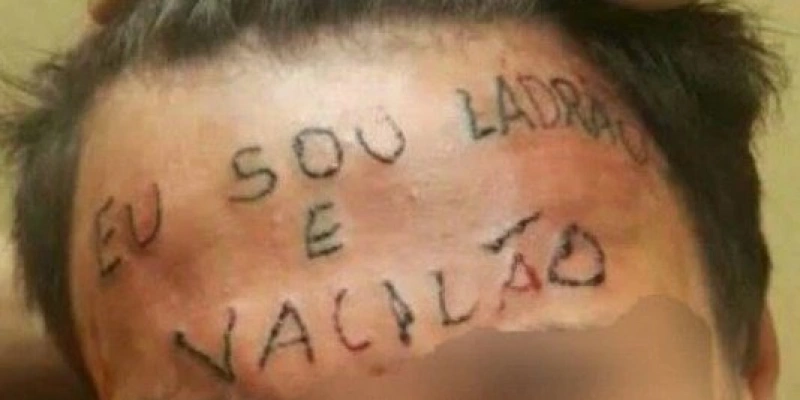 Homem com tatuagem “eu sou ladrão e vacilão” - Reprodução